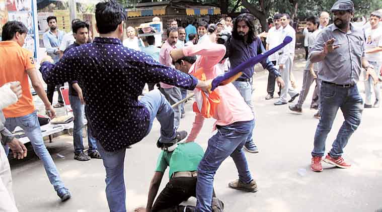 Clash between members of Singh Sena and Youth for Buddhist India. (Express Photo: Prem Nath Pandey)
