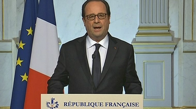 French President Francois Hollande makes a televised address in Paris early Friday July 15, 2016 after a truck drove onto a sidewalk for more than a mile, plowing through Bastille Day revelers who'd gathered to watch fireworks in the French resort city of Nice on Thursday, July 14. (French Pool via AP)