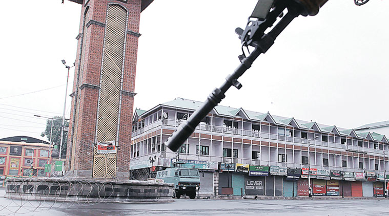 A deserted Lal Chowk during curfew in Srinagar, Sunday. (Source: Express photo by Shuaib Masoodi)