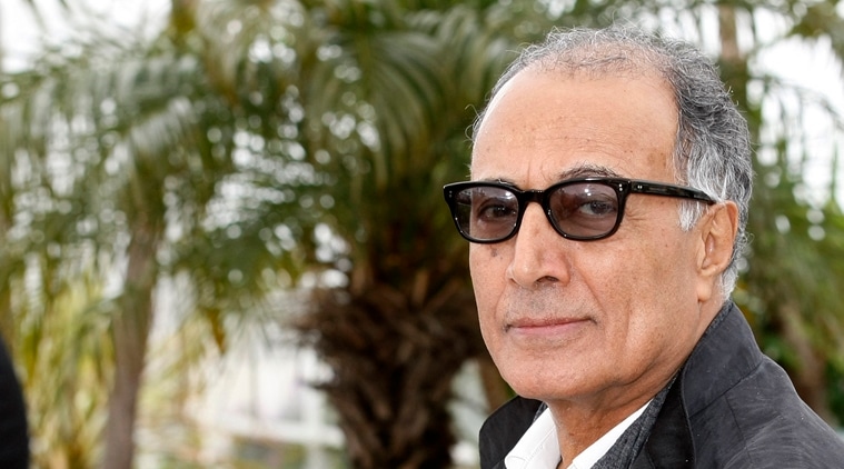 FILE - In a May 21, 2012 file photo, Iranian film director Abbas Kiarostami poses during a photo call for Like Someone in Love at the 65th international film festival, in Cannes, southern France. Iran's official news agency IRNA says Kiarostami, whose 1997 film "Taste of Cherry" won the Palme d'Or, died Monday, July 4, 2016, in Paris, where he had gone for cancer treatment. He was 76. (AP Photo/Lionel Cironneau, File)