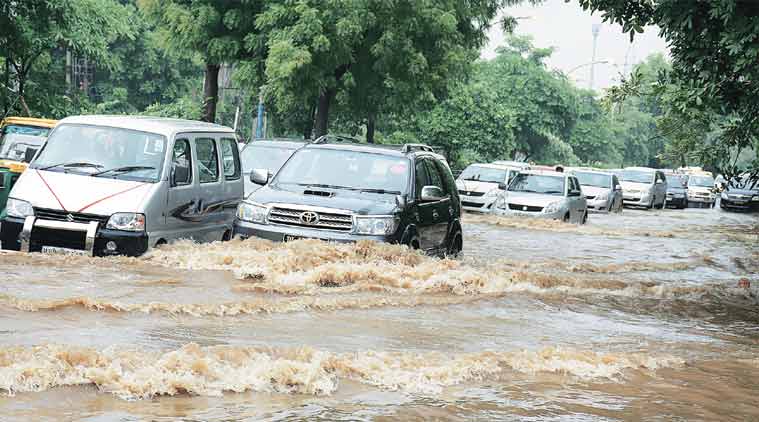 Gurgaon: Traffic crawls after rain | Delhi News - The Indian Express