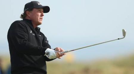 Phil Mickelson of the United States watches his shot. (Source: AP)