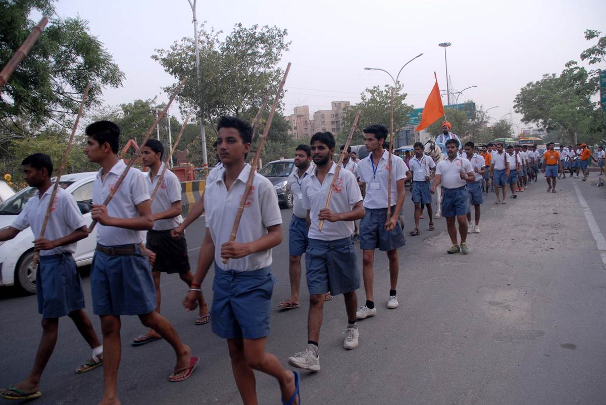 RSS worker during a rally in Noida. Express Photo by Gajendra Yadav,