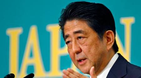 FILE - In this June 21, 2016 file photo, Japanese Prime Minister Shinzo Abe speaks during the debate of the political party leaders ahead of the July upper house election in Tokyo.  Japan's government and central bank appear to be readying a fresh dose of economic stimulus to help revive stalling growth. (AP Photo/Shizuo Kambayashi, File)