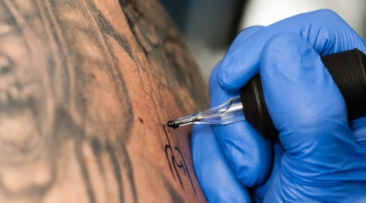 A tattooist in Austria decided to draw an impromptu phallic figure and obscenity on a woman's back. (Source: Thinkstock Images)
