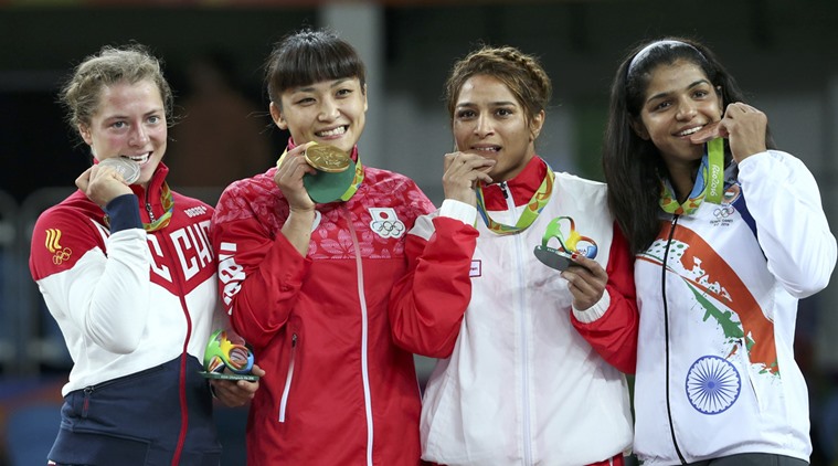 Heres Why Olympians Bite Their Medals When Clicking Pictures 