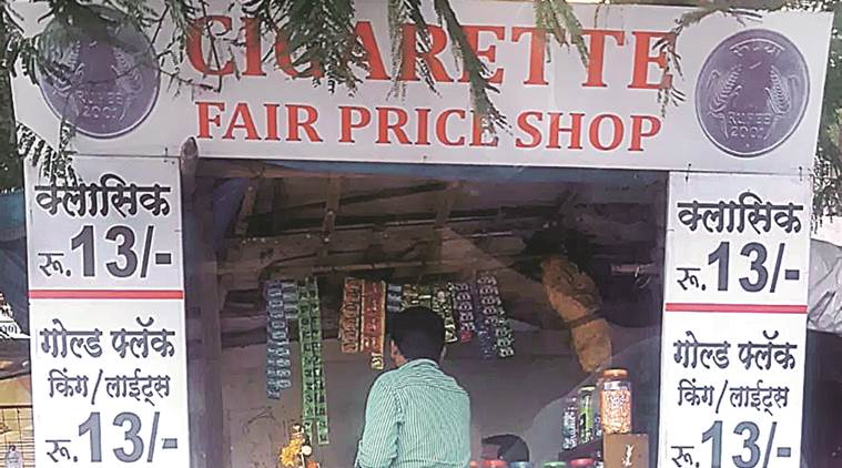 Across Pune fair price hoardings promoting cigarette sales in