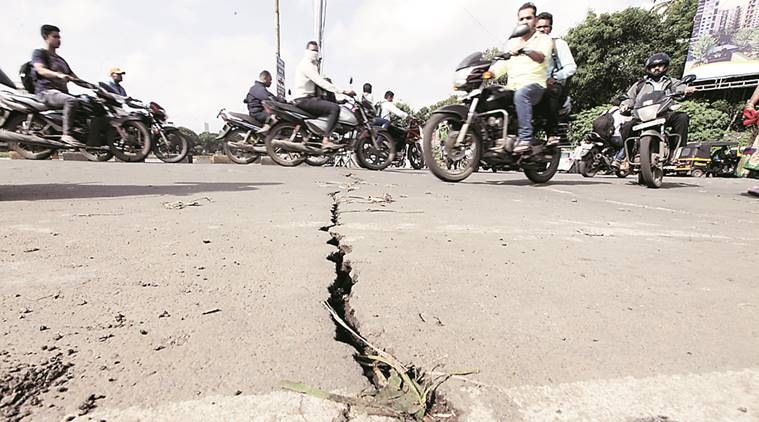 Damage was seen to the Bhide bridge which had got submerged under water during Wednesday rains. The cracks were noticed on Thursday after water receded. Express Photo By Pavan Khengre,04.08.16,Pune.