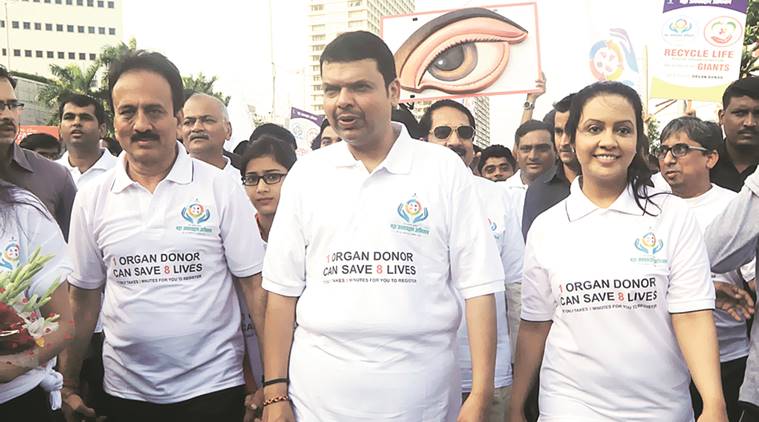 Devendra Fadnavis, Chief Minister of Maharashtra flags off Organ donation awareness rally Also Seen Picture Amruta Fadnavis,Girish Mahajan. in Marin Drive,Mumbai on Tuesday. Express Photo By-Ganesh Shirsekar 30/08/2016
