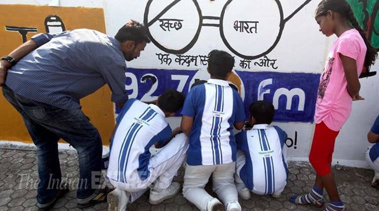 (Representational) School children get together to paint messages of Swachh Bharat and the symbolic spectacles of Mahatma Gandhi on the occasion of Gandhi Jayanti in Vadodara Express Photo By Bhupendra Rana 02-10-2015