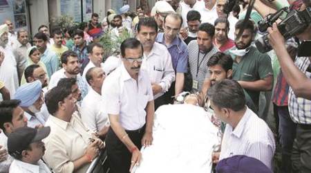 RSS leader Brig.Jagdish Gagneja being shifted to DMC Ludhiana from Patel hospital in Jalandhar on Sunday. Express Photo