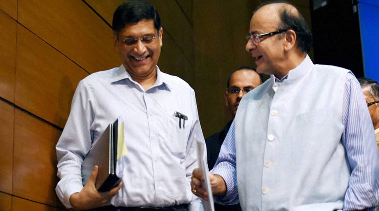 Union Finance Minister, Arun Jaitley with Chief Economic Advisor Arvind Subramanian after a Press Conference on the Goods and Services Tax in New Delhi on Thursday. (PTI Photo)