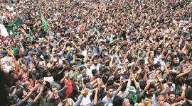 Residents protest in Aripanthan Tuesday against the killing of civilians in firing by security forces. AP