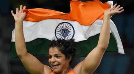 rio, rio olymoics, sakshi malik, sakshi malik olympics, olympics medalist, sakshi malik parents, aap government, delhi government, sakshi malik parents honoured, sports news, indian express news, olympics updates