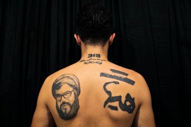 shiite muslims, shiite muslim tattoos, religious tattoos, tattoos in iran, syrian religious tattoos,