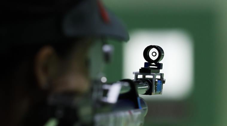 China's Yi Siling practices during the Women's 10m Air Rifle competition practice session ahead of the 2016 Summer Olympics in Rio de Janeiro, Brazil, Friday, Aug. 5, 2016. (AP Photo/Hassan Ammar)