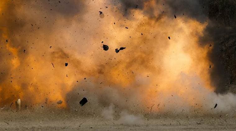 A dummy acting as a motorcycle suicide bomber is blown up next to a vehicle during a course on blast scene investigation near Hua Hin, Thailand January 17, 2016. To match SOUTHEASTASIA-SECURITY/ REUTERS/Jorge Silva
