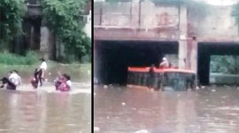 delhi rains, delhi rainfall, delhi flooded, rains, delhi waterlogging, 70 schoolchildren rescue, Delhi bus trapped waterlogged underpass , traffic jam update, india news, delhi news