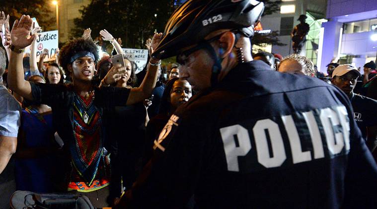 Charlotte protests, Charlotte police shooting, Charlotte black man shooting, Charlotte shooting police tape, news, US news, Charlotte curfew, world news, international news, latest news, Keith Lamont Scott