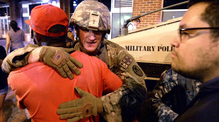 Charlotte protests, Charlotte police shooting, Charlotte black man shooting, Charlotte shooting police tape, news, US news, Charlotte curfew, world news, international news, latest news, Keith Lamont Scott