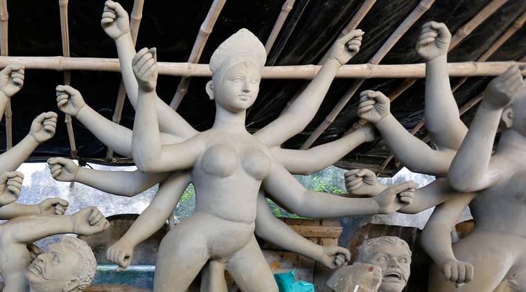 An artisan works on an idol of Hindu goddess Durga at a workshop ahead of the Durga Puja festival in Kolkata, India, September 20, 2016. REUTERS/Rupak De Chowdhuri TPX IMAGES OF THE DAY