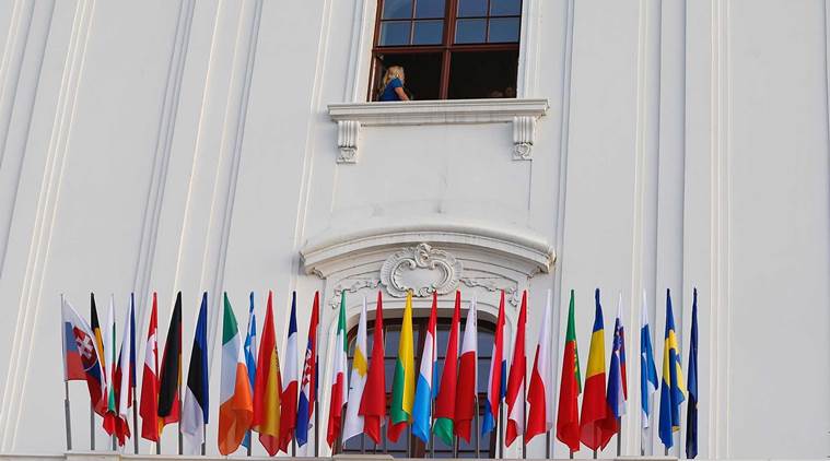The flags of member states are placed on display before an EU summit at Bratislava Castle in Bratislava on Friday, Sept. 16, 2016. An EU summit, without the participation of the United Kingdom, in Bratislava will kick off the discussion on the future of EU following Brexit. (AP Photo/Virginia Mayo)