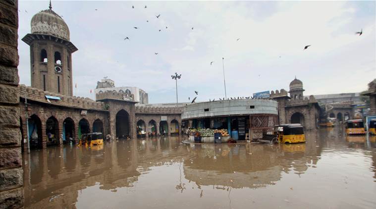 Hyderabad: A view of flooded Moazzam Jahi Market after heavy rains in Hyderabad on Thursday. PTI Photo (PTI9_22_2016_000226A)