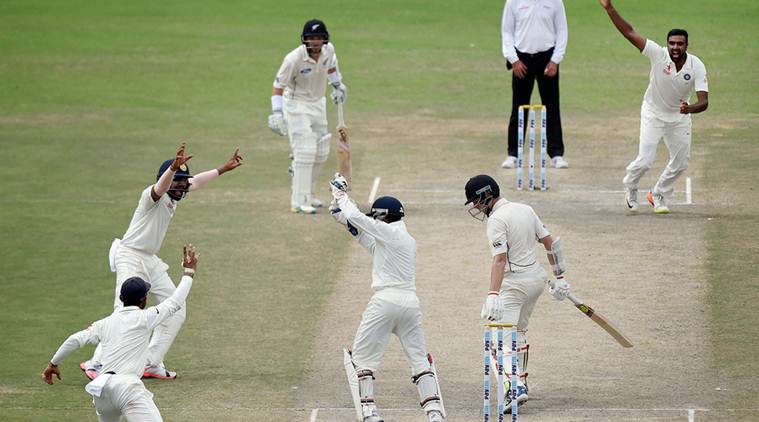 Kanpur: Indian players celebrate the wicket of New Zealand player Mitchell Santner, who was dismissed by R Ashwin, on the third day of the first Test match at Green Park in Kanpur on Saturday. PTI Photo by Atul Yadav(PTI9_24_2016_000043A)