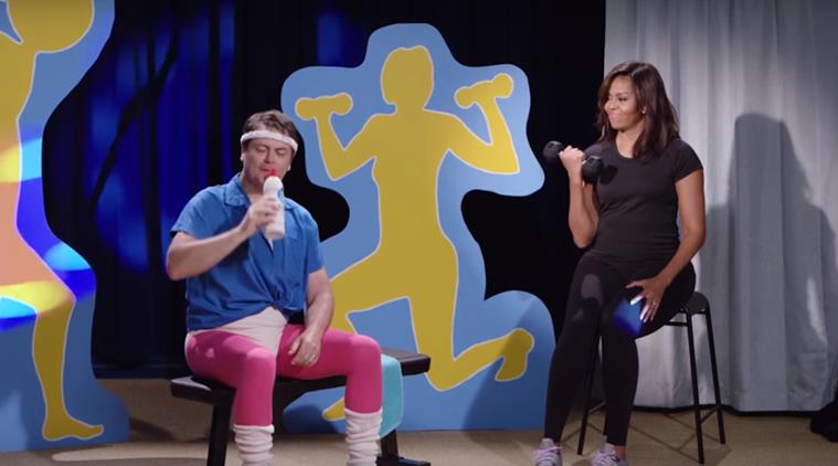 Michelle Obama and Nick Offerman in 'The History of Exercise' video. (Source: YouTube)