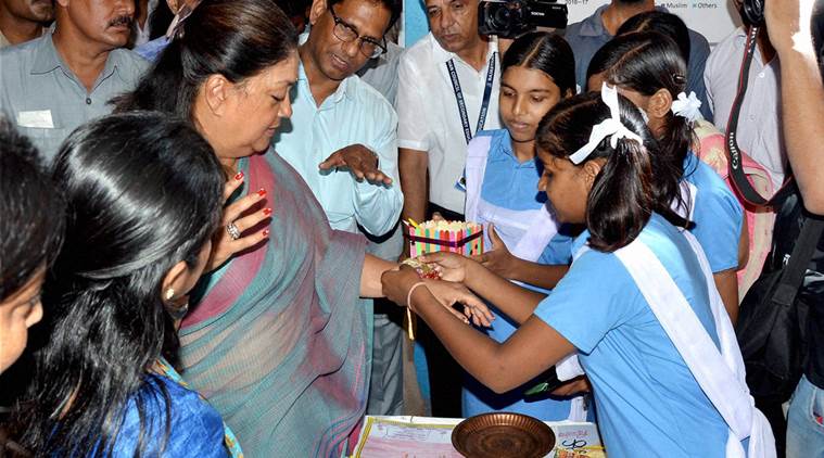 Jaipur: Rajasthan Chief Minister Vasundhara Raje spends time with students on the occasion of Teacher's Day in Jaipur on Monday. PTI Photo (PTI9_5_2016_000239A)