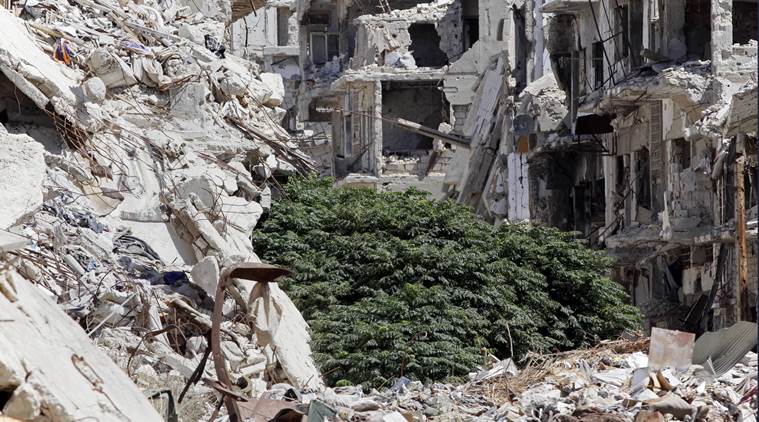 Damaged buildings and rubble line a street in the Old City, Homs, Syria, Sept. 19, 2016. SyriaÄôs military command has declared the U.S-Russian brokered cease-fire over, blaming the rebel groups for undermining it. In a statement Monday, the Syria military said Äúthe armed terrorist groupsÄù repeatedly violated the cease-fire which came into effect last week. (AP PHOTO)
