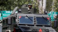 An army soldier guards the army base Militants in Kashmir, Kashmir news, Tral hideout for Militants, Militancy in Kashmir, Kasmhir news, kashmir Militancy latest, Kashmir latest news, India news, Ksahmir Violence latest, KAshmir latest, India news