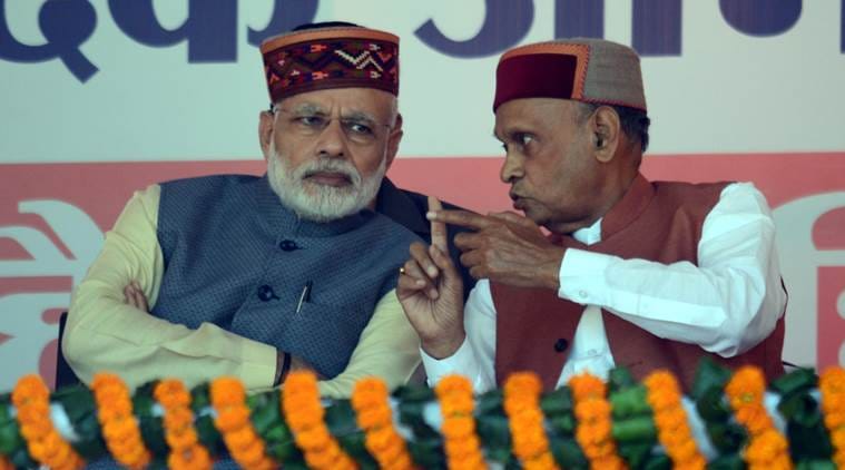 Prime Minister Narendra Modi with former Chief Minister Prem Kumar Dhumal Modi during a parivartan rally in Mandi on Tuesday. Express photo by Lalit Kumar. 18.10.2016.