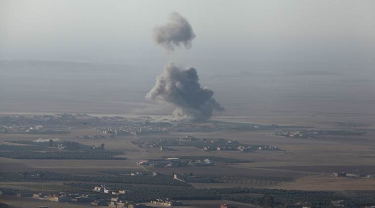 Smoke rises at Islamic State militants' positions in the town of Naweran near Mosul, Iraq, October 23, 2016. REUTERS/Azad Lashkari