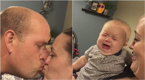 viral videos, funny baby video, baby crying parents kissing, baby crying parents kissing video, viral baby video, trending videos, viral news, latest news, Indian express