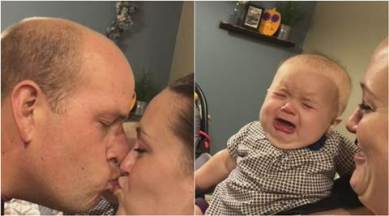 viral videos, funny baby video, baby crying parents kissing, baby crying parents kissing video, viral baby video, trending videos, viral news, latest news, Indian express
