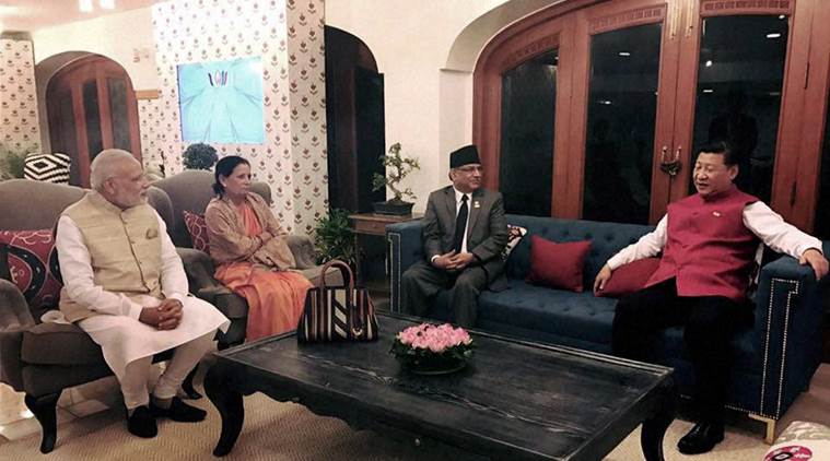 Prime Minister Pushpa Kamal Dahal 'Prachanda' with his Indian counterpart Narendra Modi and Chinese President Xi Jinping during a trilateral meeting on the sidelines of the BRICS Summit at Benaulim in Goa on Saturday. (Source: PTI photo)