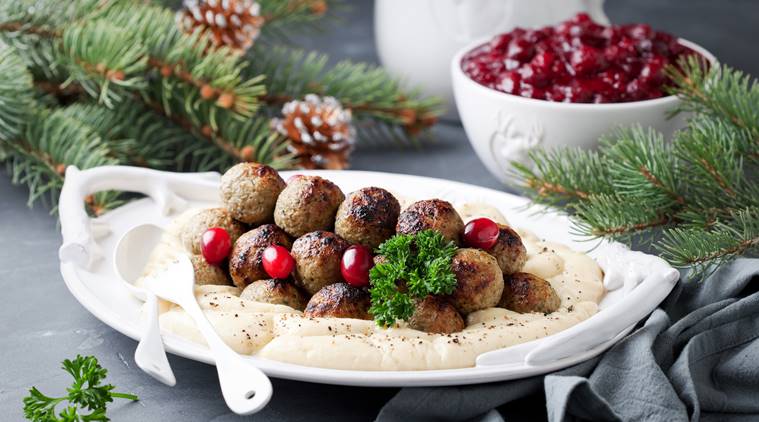 Homemade swedish meatballs with mashed potatoes and cranberry sauce, selective focus