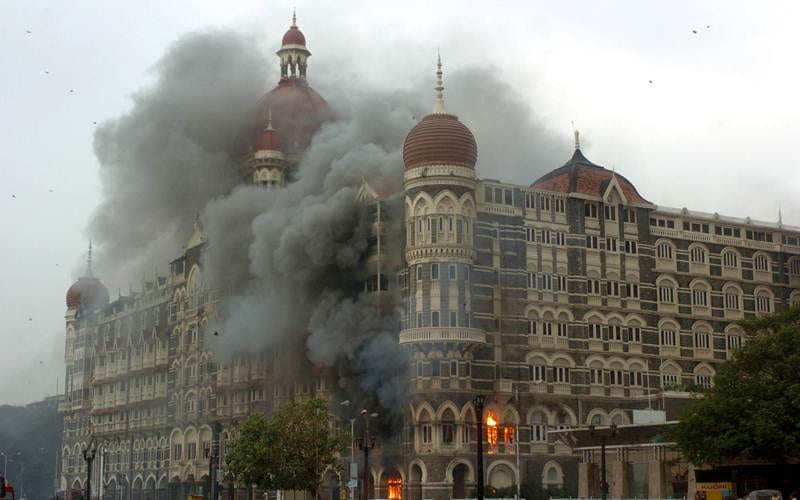 In the early hours of Saturday, terrorists set fire to the Taj Mahal Hotel in strong smoke.  Express photo by Ganesh Shirsekar.  Mumbai 29/11/08