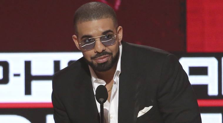 Drake accepts the award for favorite artist - rap/hip-hop at the American Music Awards at the Microsoft Theater on Sunday, Nov. 20, 2016, in Los Angeles. (Photo by Matt Sayles/Invision/AP)