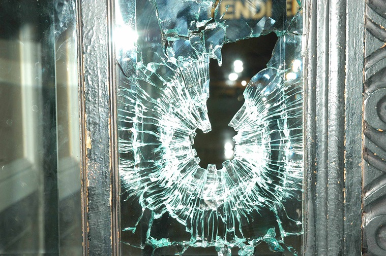 Bullet marks on the glass at Cafe Leopold in Colaba. Vasant Prabhu *** Local Caption *** "Bullet marks on the glass at Cafe Leopold after unidentiufied gunmen started firing at Colaba on Wednesday. Express Photo by Vasant Prabhu, 26/12/2008"