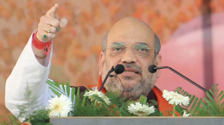 Saharanpur: BJP National President Amit Shah addresses a gathering during "Parivartan Yatra" in Saharanpur on Saturday. PTI Photo (PTI11_5_2016_000200A)