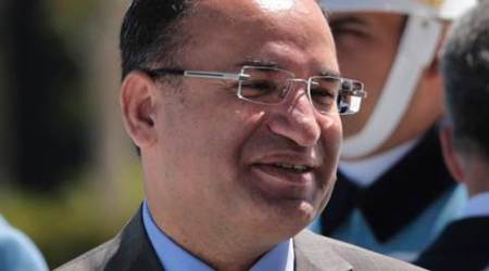 FILE - In this April 16, 2016 file photo, Turkey's Justice Minister Bekir Bozdag waits for a ceremony at the presidential palace in Ankara, Turkey. Bozdag says Tuesday, Oct. 25, 2016 the country has provided "more than sufficient" evidence to the United States for the extradition of a U.S.-based Muslim cleric accused by Turkey of orchestrating the July 15 failed coup attempt. Bozdag was speaking to reporters Tuesday before departing to the U.S. for talks with U.S. Attorney General Loretta Lynch over Turkish requests for Fethullah Gulen's arrest and eventual extradition. (AP Photo/Burhan Ozbilici, File)