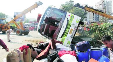 bus accident, pune bus accident, two pilgrims dead, 40 pilgrims injured, tourist bus meets with an accident, indian express news