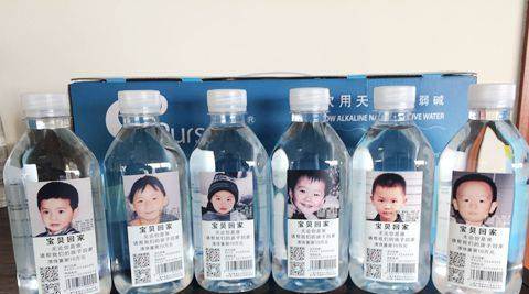 In China, photographs of missing children are printed on bottled water. Here’s why