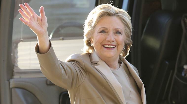 Democratic presidential candidate Hillary Clinton waves as she arrives to vote at her polling place in Chappaqua, N.Y., Tuesday, Nov. 8, 2016. (AP Photo/Seth Wenig)