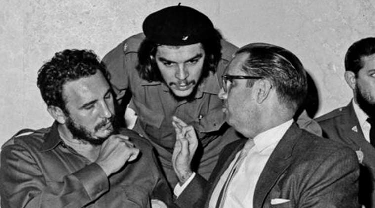 Ernesto "Che" Guevara, center, Cuba's leader Fidel Castro, left, and Cuba's President Osvaldo Dorticos, right, attend a reception in an unknown location in Cuba in 1960. (AP Photo)