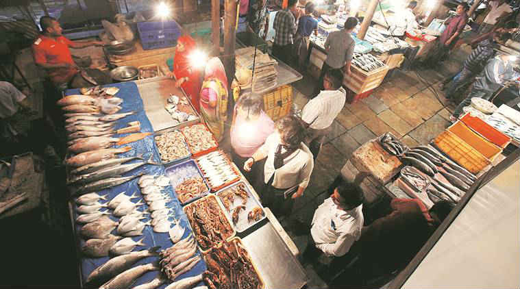 At some fish markets in Pune, a reluctant switch to plastic money