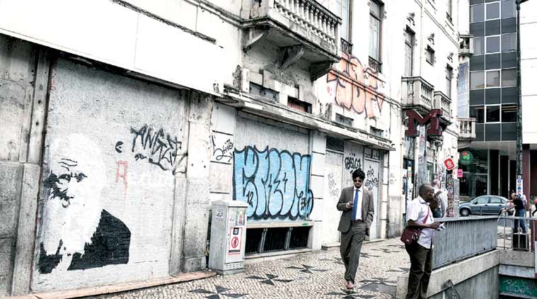 Graffiti depicting Karl Marx on a wall near the offices of the Bank of Portugal in Lisbon, Portugal. (Source: Miguel Ribeiro Fernandes/International Herald Tribune)