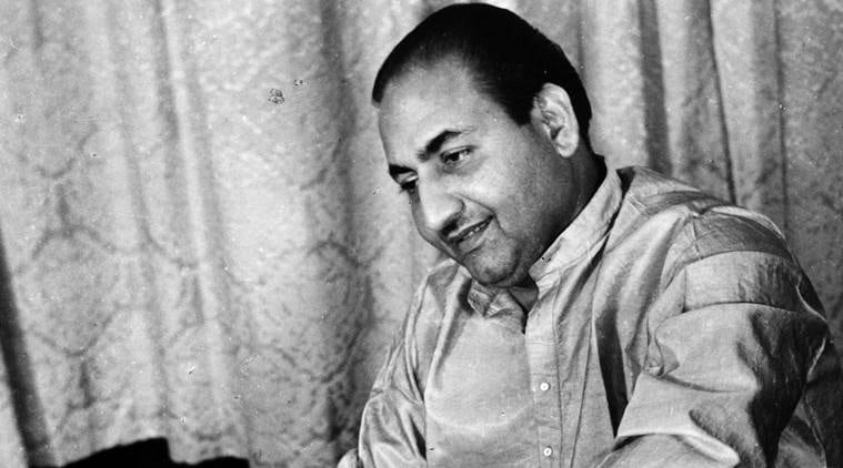 Playback singer Mohammad Rafi playing harmonium. Express archive photo by Mohan Wagh